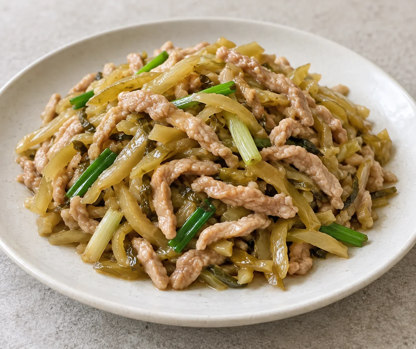 Illustration of Fuling Pickled Mustard Tuber with Shredded Pork, a cooked dish.